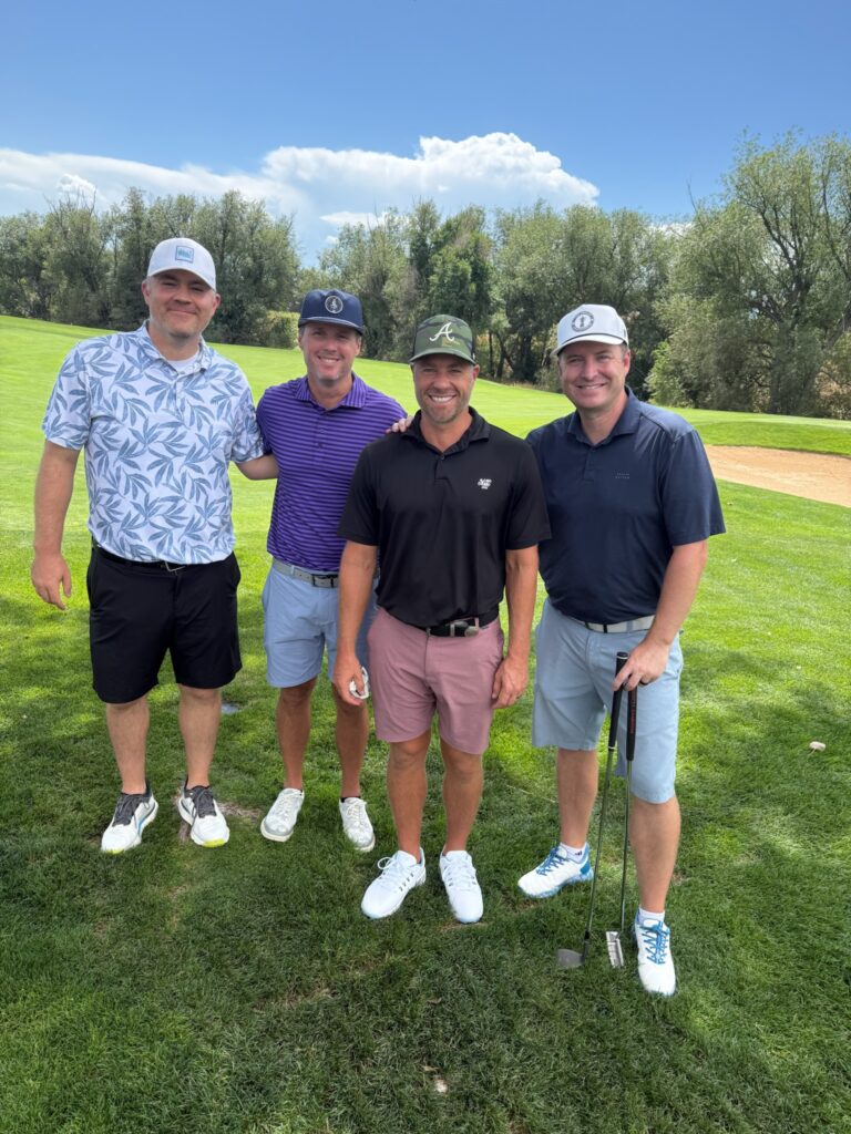 Jeff Heidrick with pink pants and his foursome