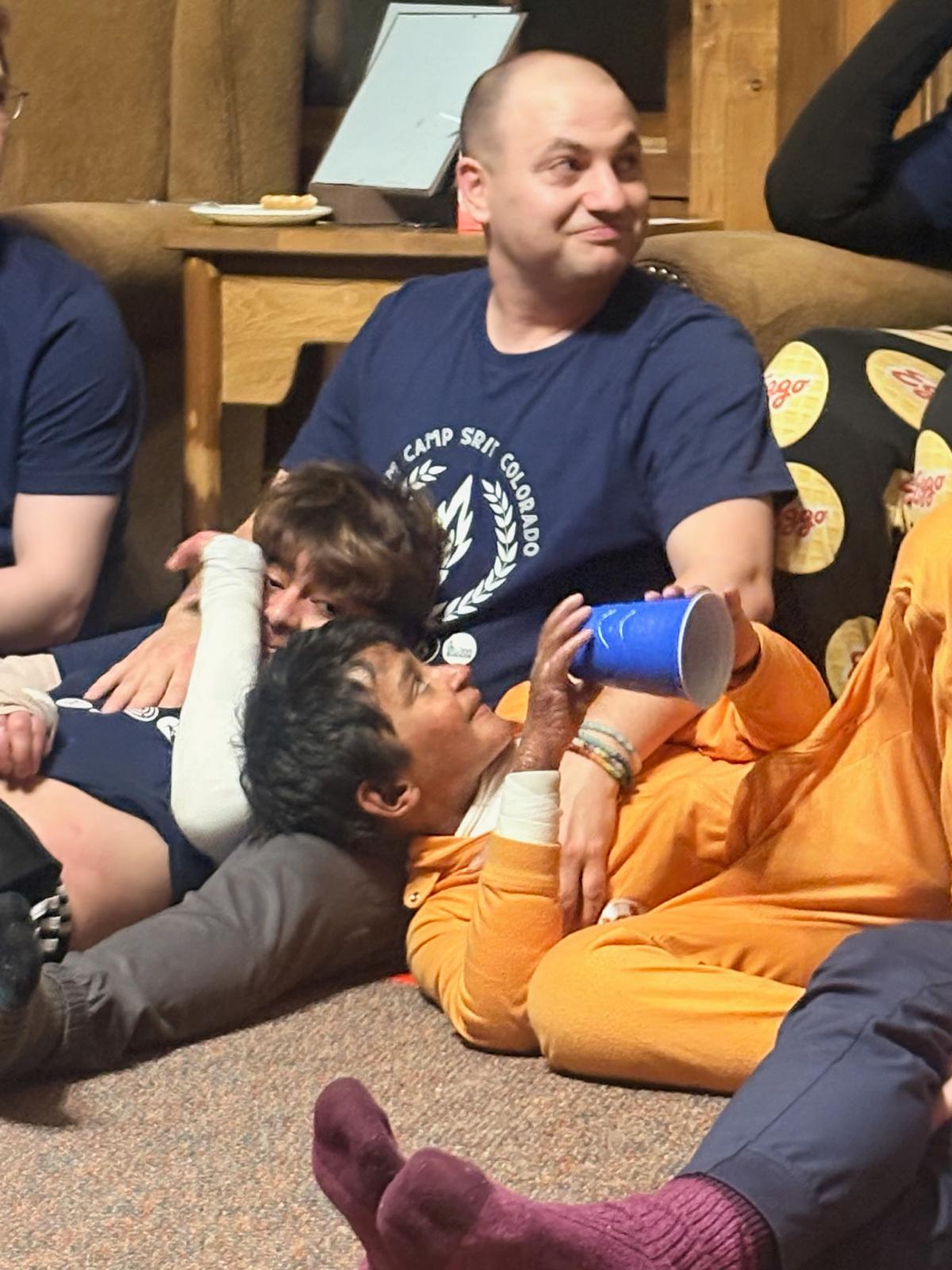 Alex, Alex and Salim snuggle