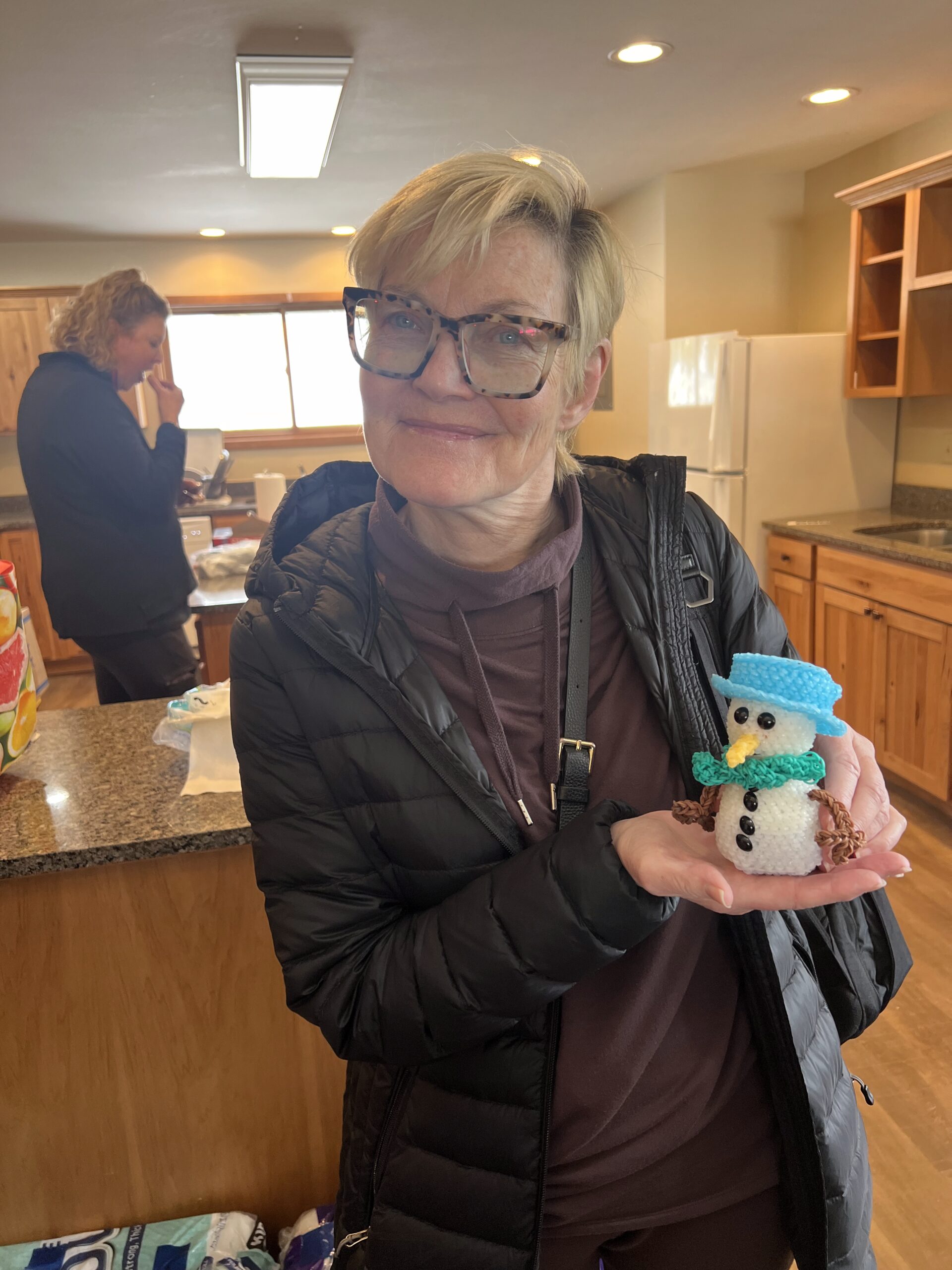 MJ with Ella's snowman loom project